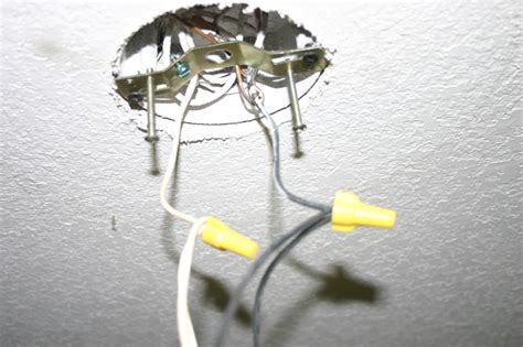 attaching light fixture to junction box|standard light fixture screw size.